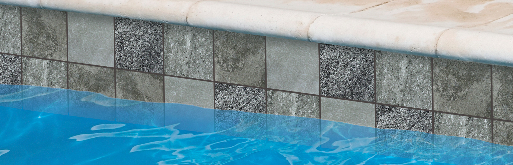 grey stone pool tile with travertine coping